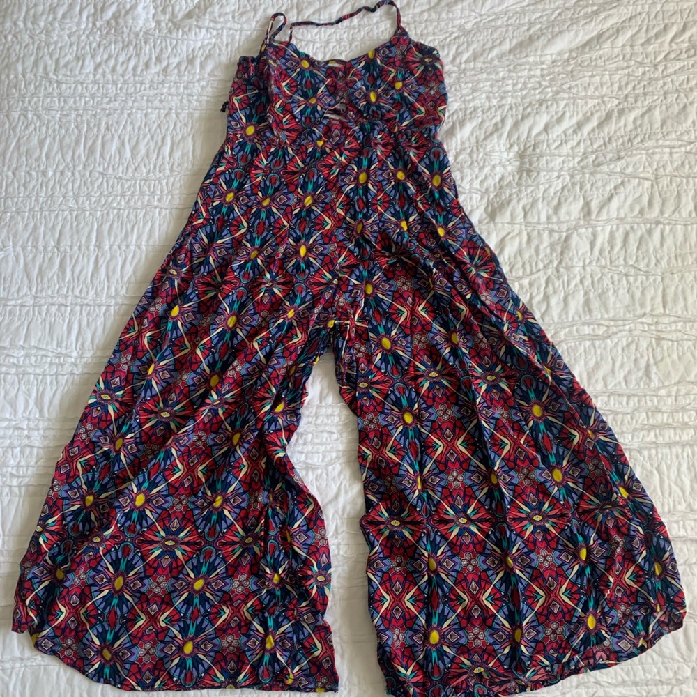 Cute flare long romper/jumpsuit with lace back .